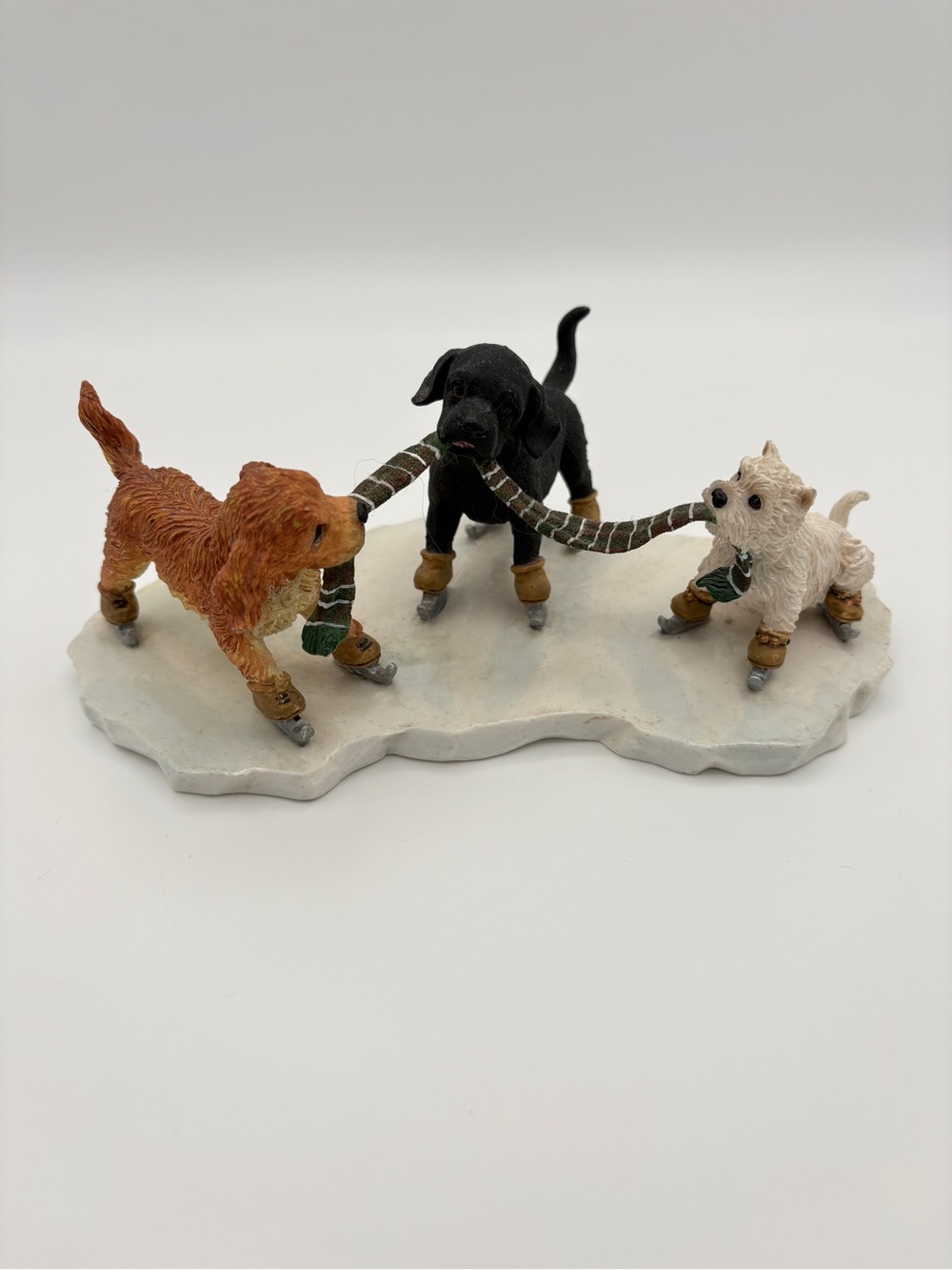 Big Sky Canine by Big Sky Carvers 3 Dogs Ice Skating Tug of War